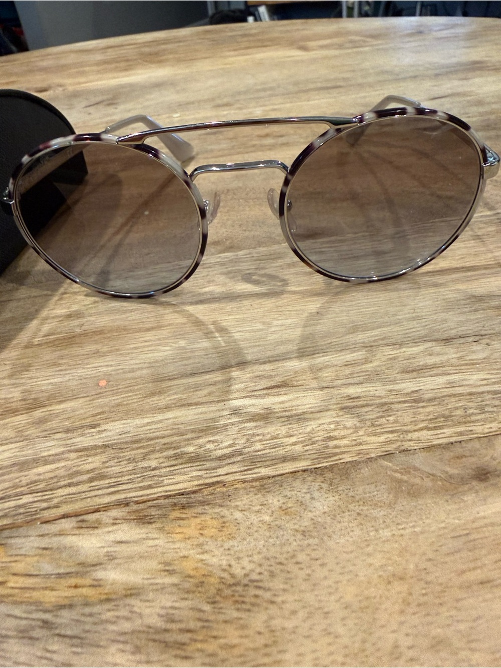 Prada Silver Frame Round Sunglasses with Gray Gradient Lenses